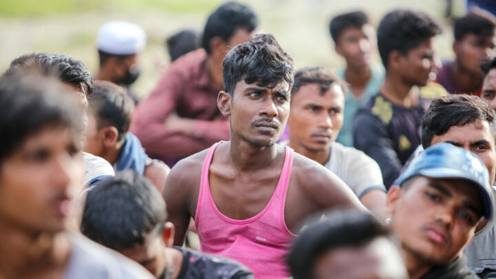 In this photograph taken in Indonesia, Rohingya refugees arrive at a beach in Gampong Baro village, Aceh Besar, Aceh province on January 8, 2023.